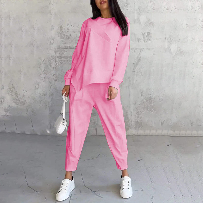 Conjunto de dos piezas para mujer: sudadera de manga larga con bajo asimétrico y pantalón.